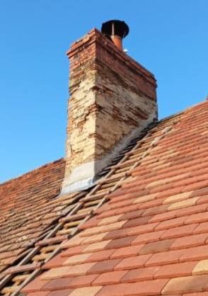 Réfection cheminée sur toiture tuiles rouges